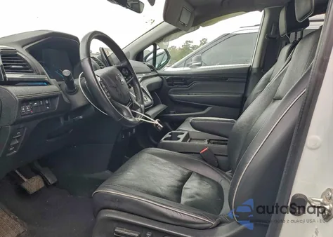 2021 Honda Odyssey Elite z USA, uszkodzony, nr VIN 5FNRL6H95MB015802